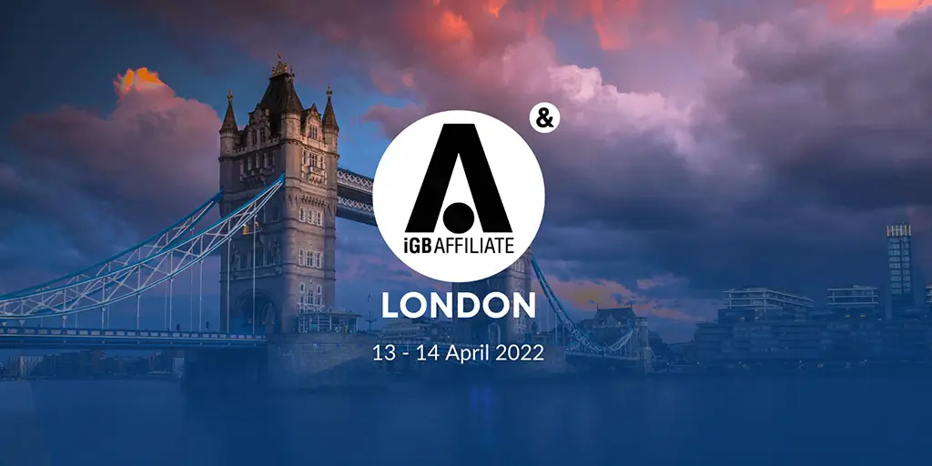 iGB Affiliate London 2022 event banner over Tower Bridge, dated 13–14 April 2022.